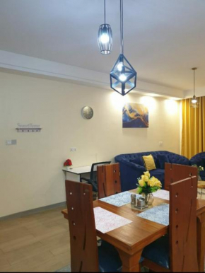 Elegant classy apartment with modern equipped gym, private parking space,and proximity to major shopping malls